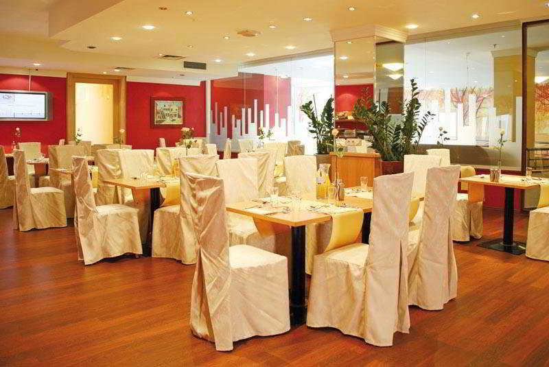 Dion Hotel Villach Restaurant bilde